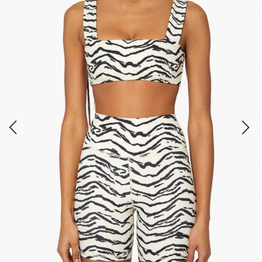 We wore what tiger biker shorts & top NWT
